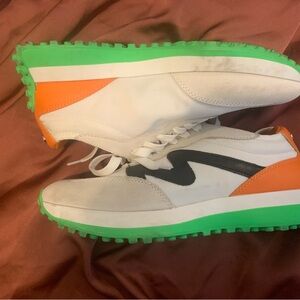 White Sneakers with Green Soles and Orange Accents